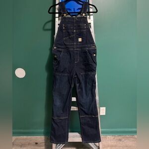 Carhartt unlined denim overalls. Size XS (0-2) short. Relaxed fit.